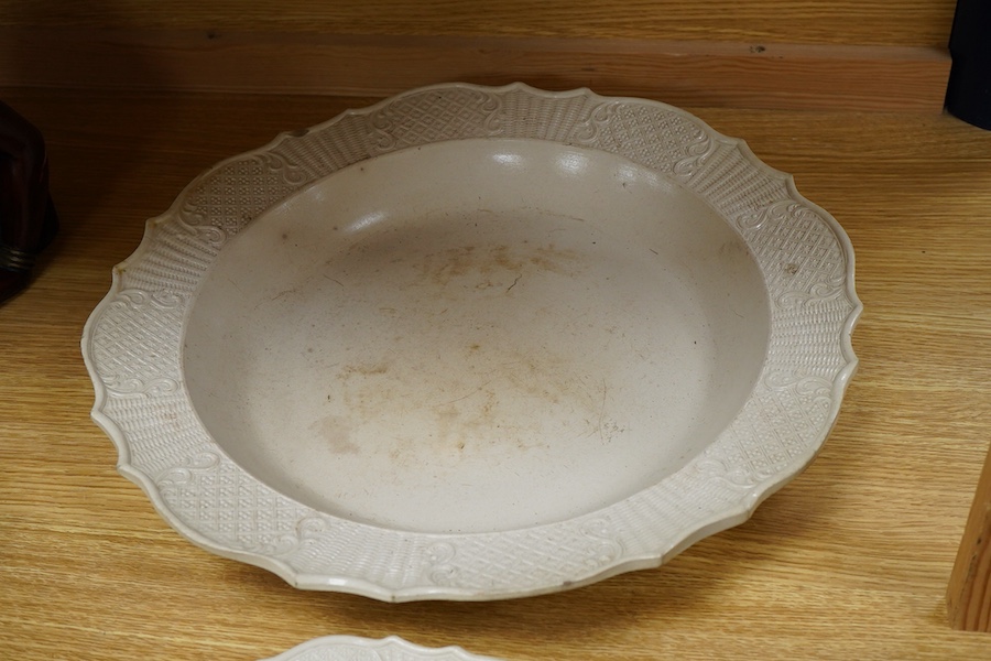 A large English salt-glazed stoneware dish and a similar plate, largest 43cm